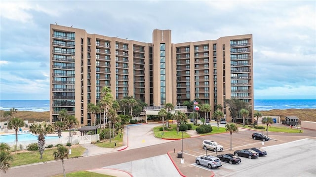 view of building exterior with a water view