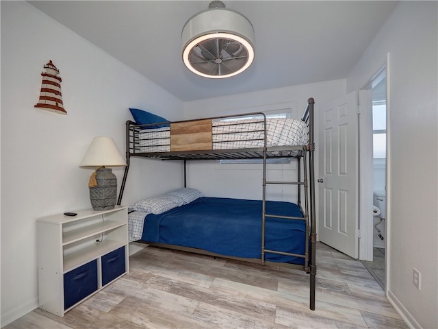 bedroom with light hardwood / wood-style floors