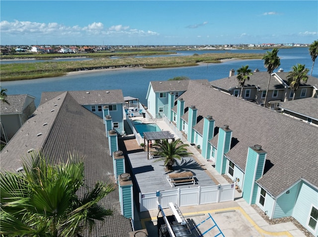 drone / aerial view with a water view