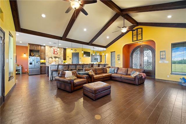 living room featuring high vaulted ceiling, dark hardwood / wood-style floors, ceiling fan, and beam ceiling