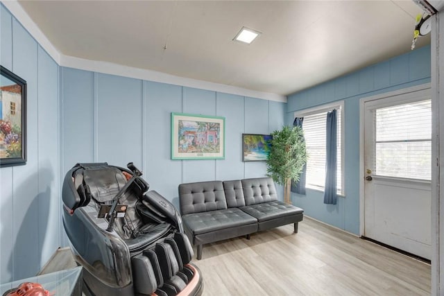 1038 Herndon St, Corpus Christi, TX 78411 - living area featuring a decorative wall and wood finished floors
