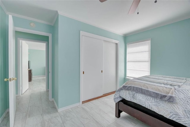 1038 Herndon St, Corpus Christi, TX 78411 - bedroom with ornamental molding, a closet, and a ceiling fan