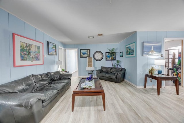 1038 Herndon St, Corpus Christi, TX 78411 - living area featuring wood finished floors and a decorative wall