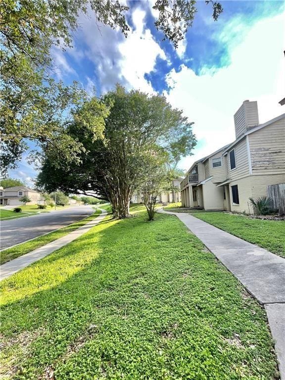 4401 River Valley Dr Unit 205, Corpus Christi, TX 78410 - view of home's community with a yard