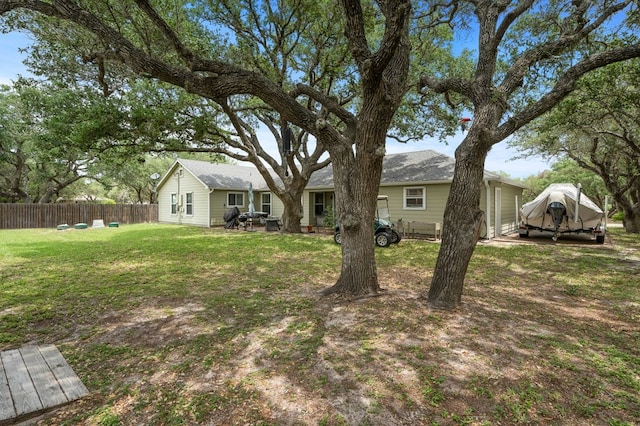 view of yard featuring fence