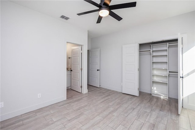 unfurnished bedroom featuring a closet and ceiling fan