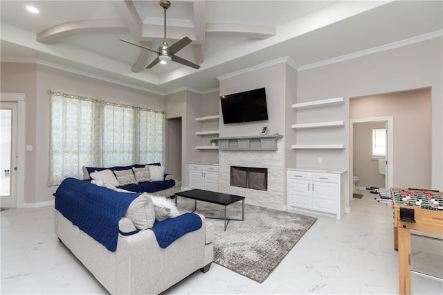 living room with beamed ceiling, a fireplace, ornamental molding, and coffered ceiling