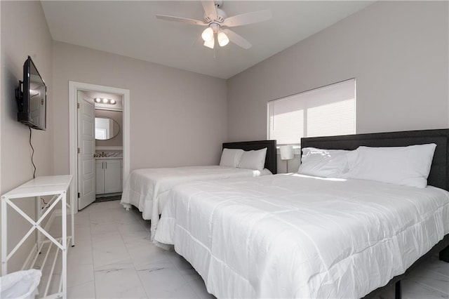 bedroom featuring ensuite bathroom and ceiling fan