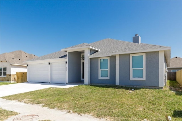 ranch-style home with a garage and a front yard