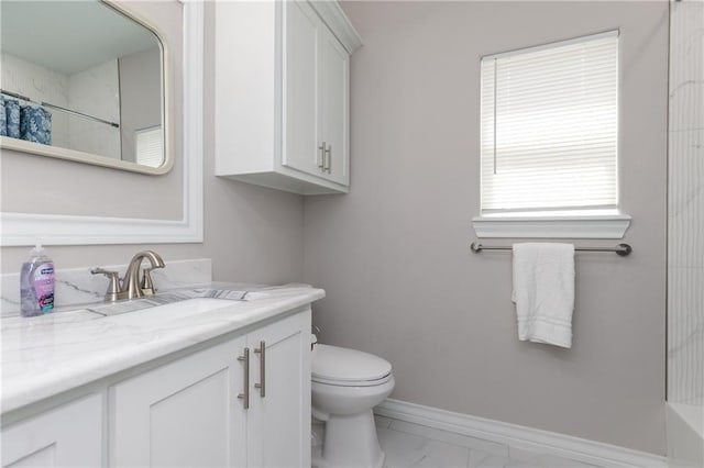 bathroom with vanity and toilet