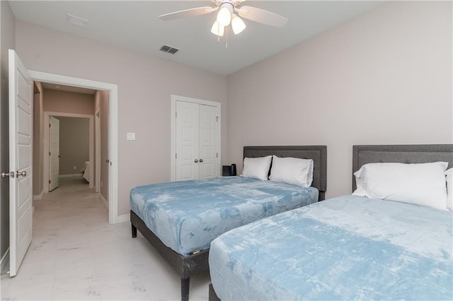 bedroom featuring a closet and ceiling fan