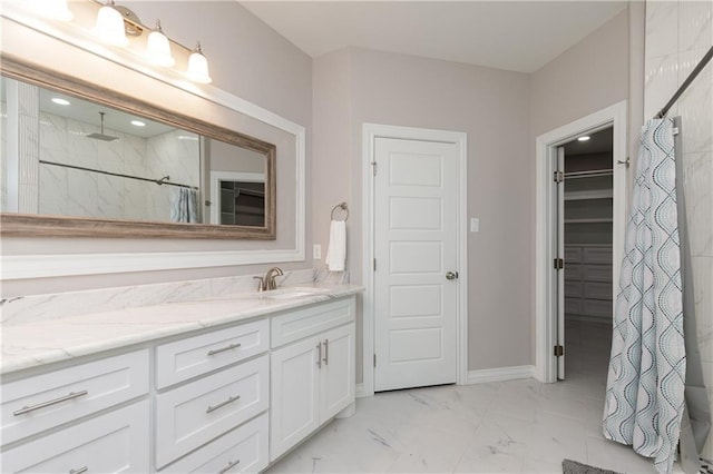 bathroom with vanity and walk in shower