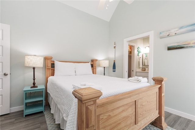 bedroom with lofted ceiling, ensuite bathroom, ceiling fan, and dark hardwood / wood-style floors