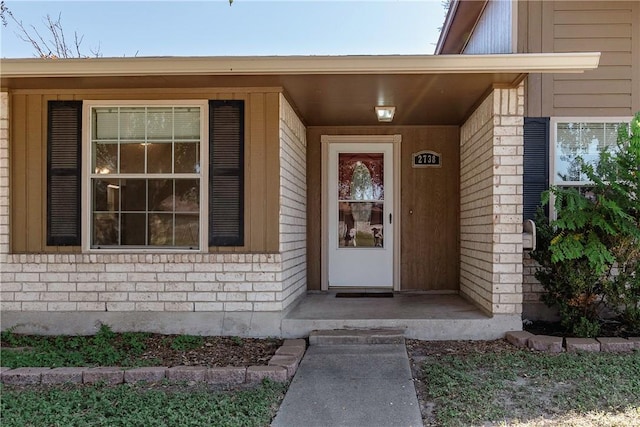 2738 Wind Rock Dr, Corpus Christi, TX 78410 - property entrance with brick siding