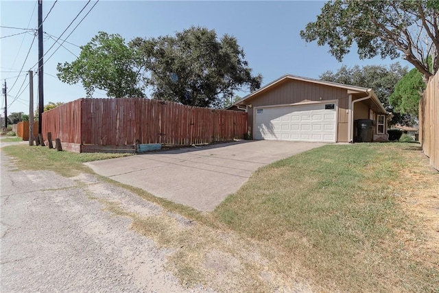 2738 Wind Rock Dr, Corpus Christi, TX 78410 - view of home's exterior featuring concrete driveway and an attached garage