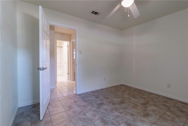 spare room featuring ceiling fan