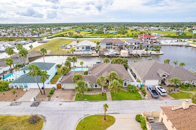 drone / aerial view with a water view