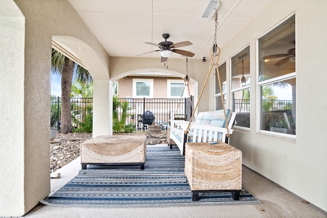 view of patio featuring ceiling fan