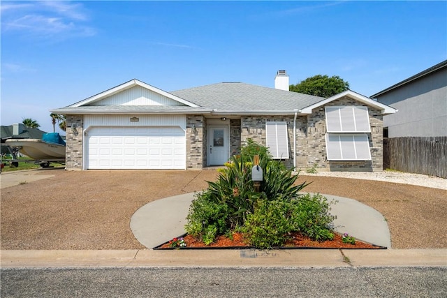 15641 Three Fathoms Bank Dr, Corpus Christi, TX 78418 - view of front of house featuring concrete driveway, a chimney, and a garage