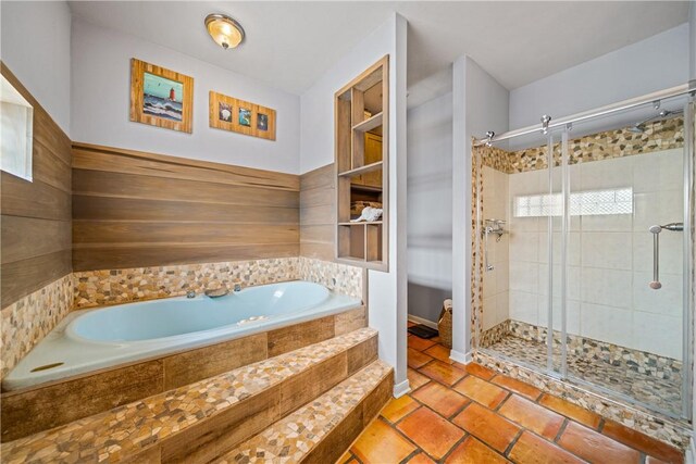 15641 Three Fathoms Bank Dr, Corpus Christi, TX 78418 - bathroom featuring a garden tub, a shower stall, tile patterned flooring, and toilet