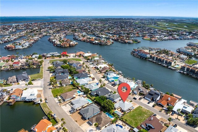 15641 Three Fathoms Bank Dr, Corpus Christi, TX 78418 - aerial view of property and surrounding area featuring nearby suburban area and a large body of water