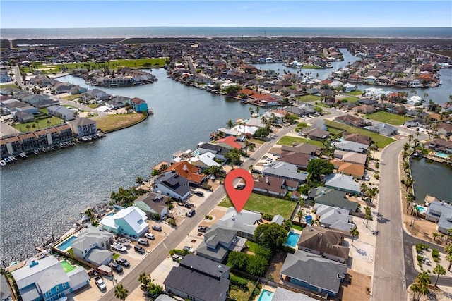 15641 Three Fathoms Bank Dr, Corpus Christi, TX 78418 - aerial view of property's location with nearby suburban area and a large body of water