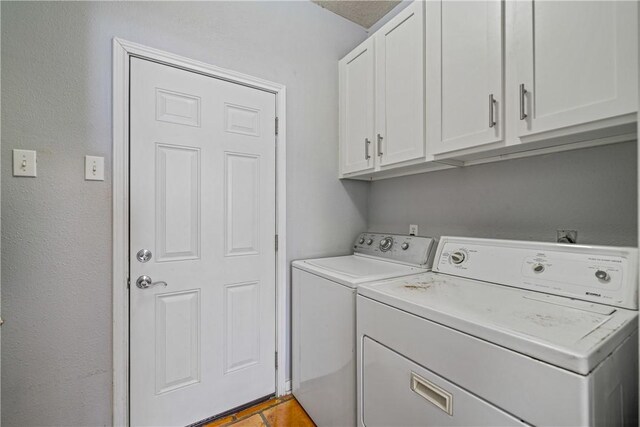 15641 Three Fathoms Bank Dr, Corpus Christi, TX 78418 - laundry area featuring cabinet space and washing machine and dryer