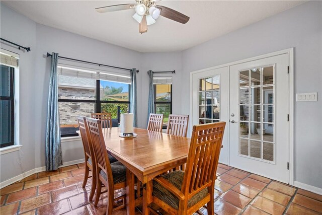 15641 Three Fathoms Bank Dr, Corpus Christi, TX 78418 - dining space featuring a ceiling fan, french doors, and baseboards