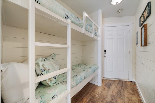 mudroom featuring dark wood-type flooring