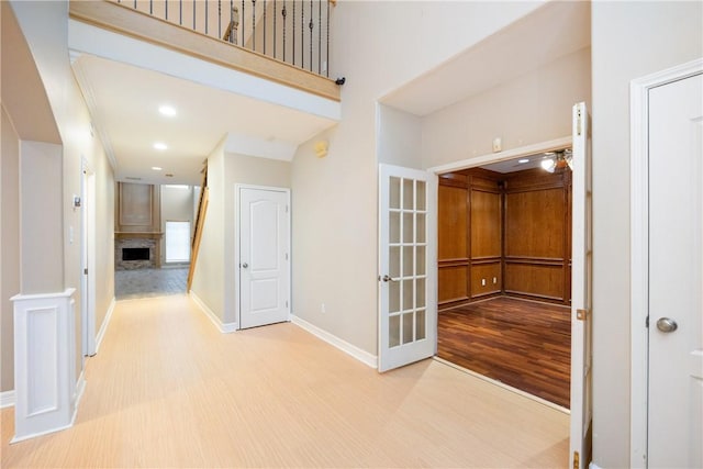 hall with light wood-type flooring