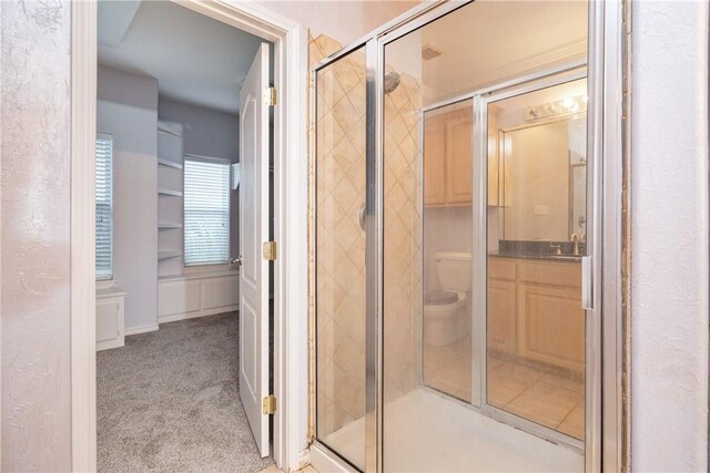 bathroom featuring vanity and walk in shower