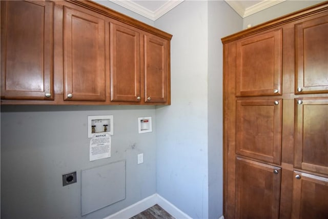 clothes washing area featuring baseboards, crown molding, cabinet space, electric dryer hookup, and hookup for a washing machine
