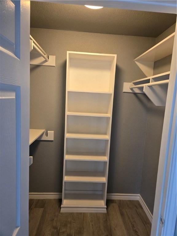 7921 Etienne Dr, Corpus Christi, TX 78414 - spacious closet featuring wood finished floors