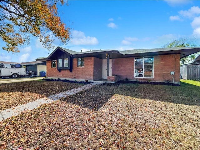 view of front of home with a front lawn