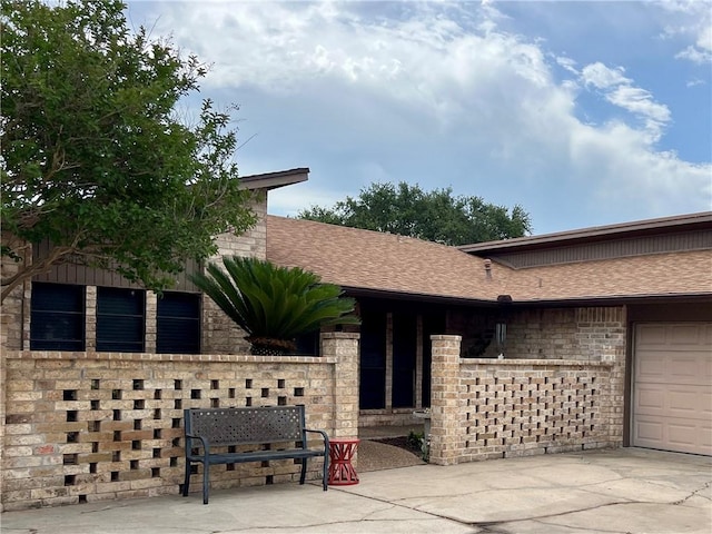 2220 Post Oak Dr, Portland, TX 78374 - view of front of property featuring roof with shingles and brick siding