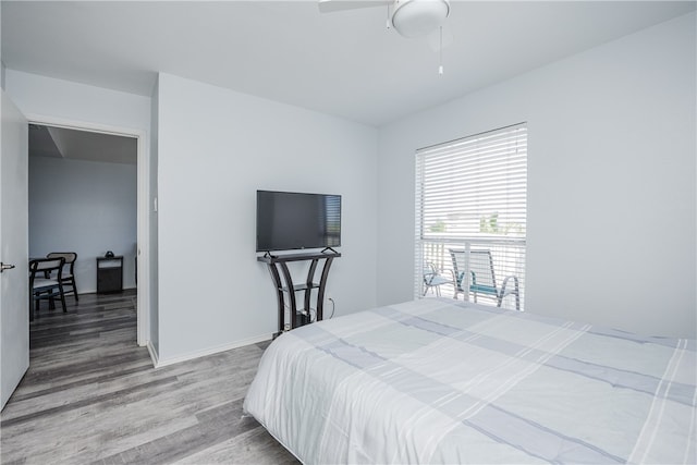 bedroom featuring wood-type flooring and ceiling fan