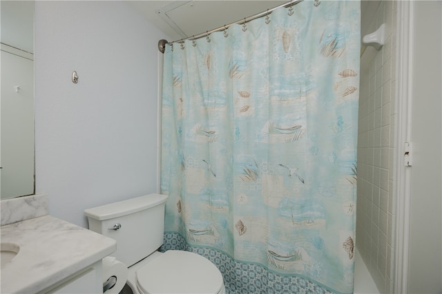 bathroom with toilet and vanity