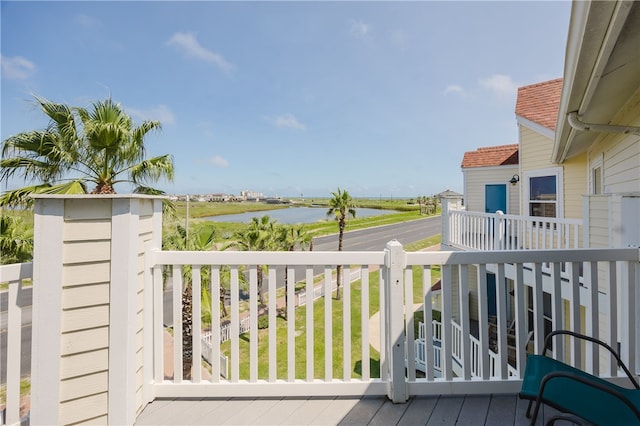 balcony featuring a water view