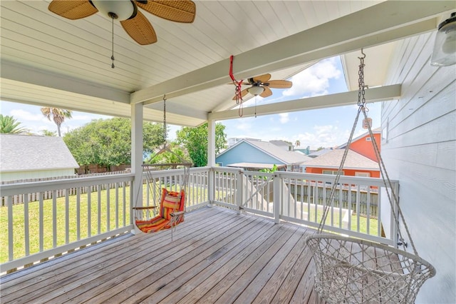 502 Corpus Christi Channel Prt, Aransas, TX 78373 - wooden deck featuring ceiling fan and a lawn