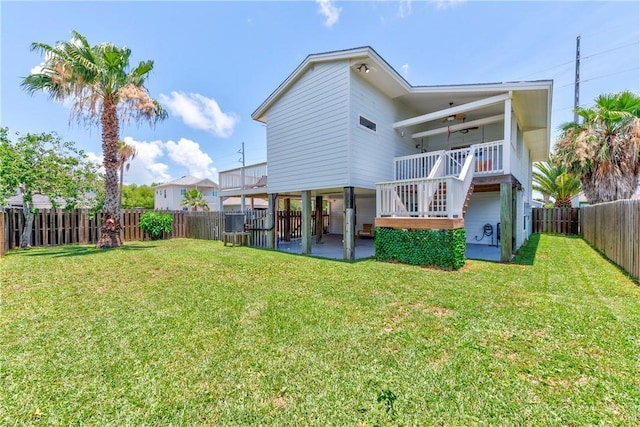 502 Corpus Christi Channel Prt, Aransas, TX 78373 - rear view of property featuring a fenced backyard, a patio area, and stairway