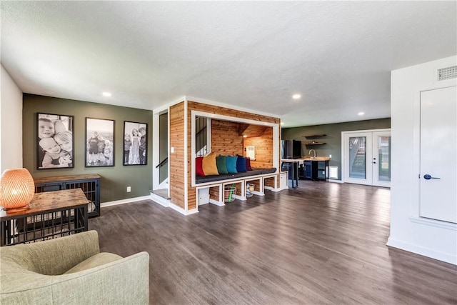 502 Corpus Christi Channel Prt, Aransas, TX 78373 - living area featuring dark wood finished floors, recessed lighting, and french doors