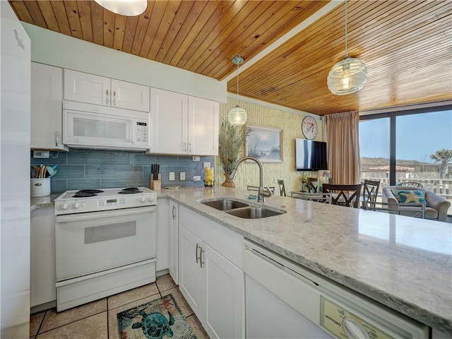 kitchen with a sink, backsplash, white appliances, wooden ceiling, and light tile patterned floors