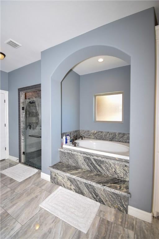 bathroom with plus walk in shower