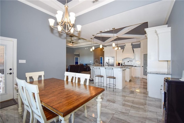 dining room featuring ornamental molding, coffered ceiling, and beam ceiling