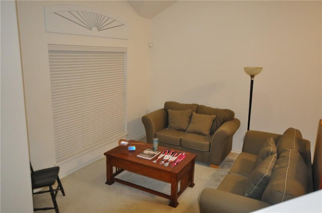 living area with light colored carpet