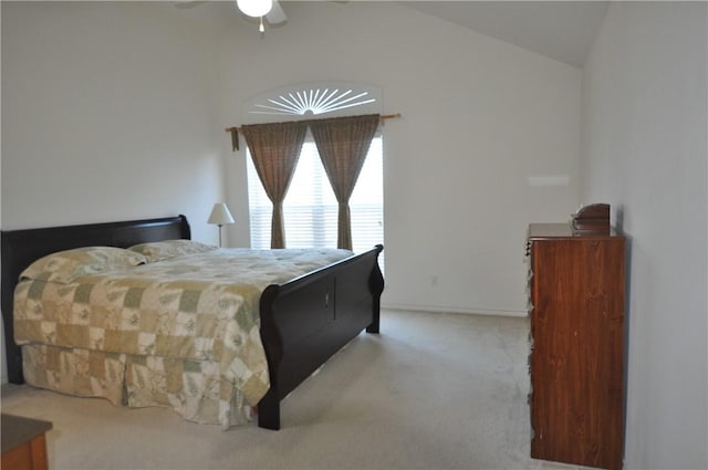 carpeted bedroom with lofted ceiling and ceiling fan