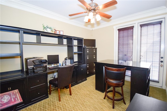 carpeted office space with ceiling fan and ornamental molding