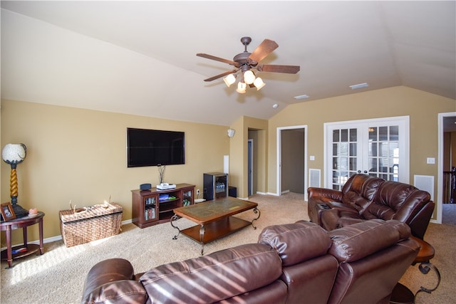 living room with ceiling fan, carpet, and vaulted ceiling