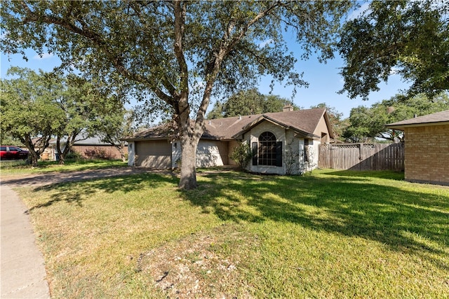 ranch-style house featuring a front yard