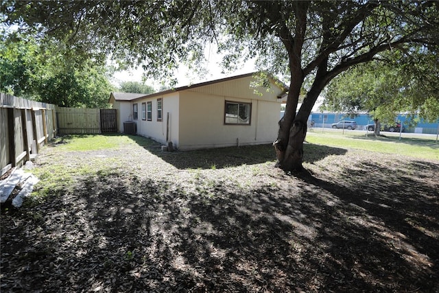 exterior space featuring central AC unit